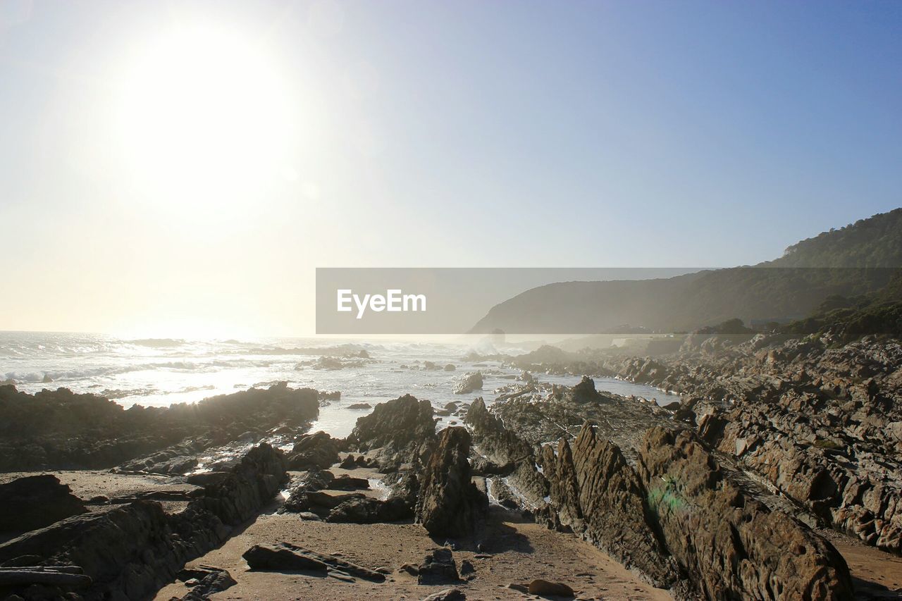 Panoramic view of sea against clear sky