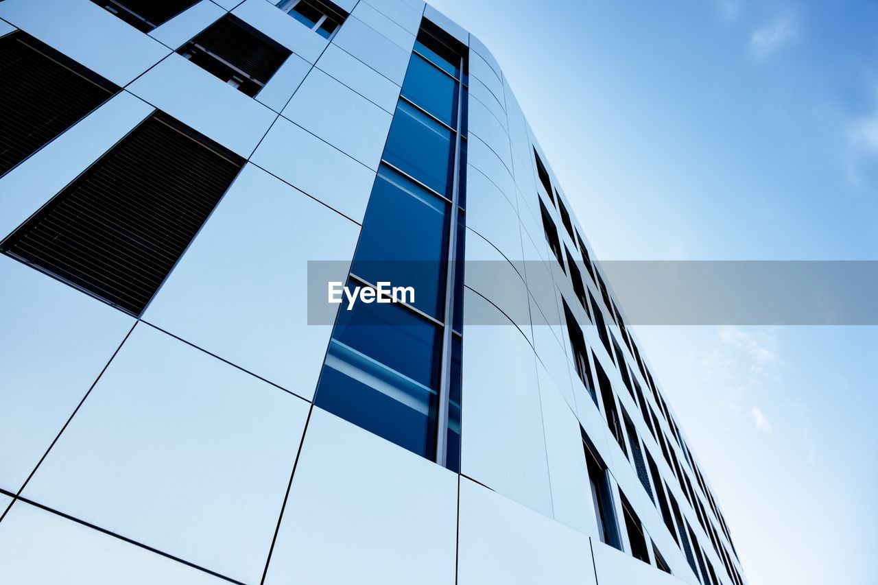 Low angle view of modern building against sky