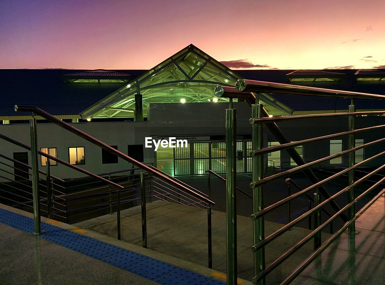 LOW ANGLE VIEW OF ILLUMINATED BUILDING