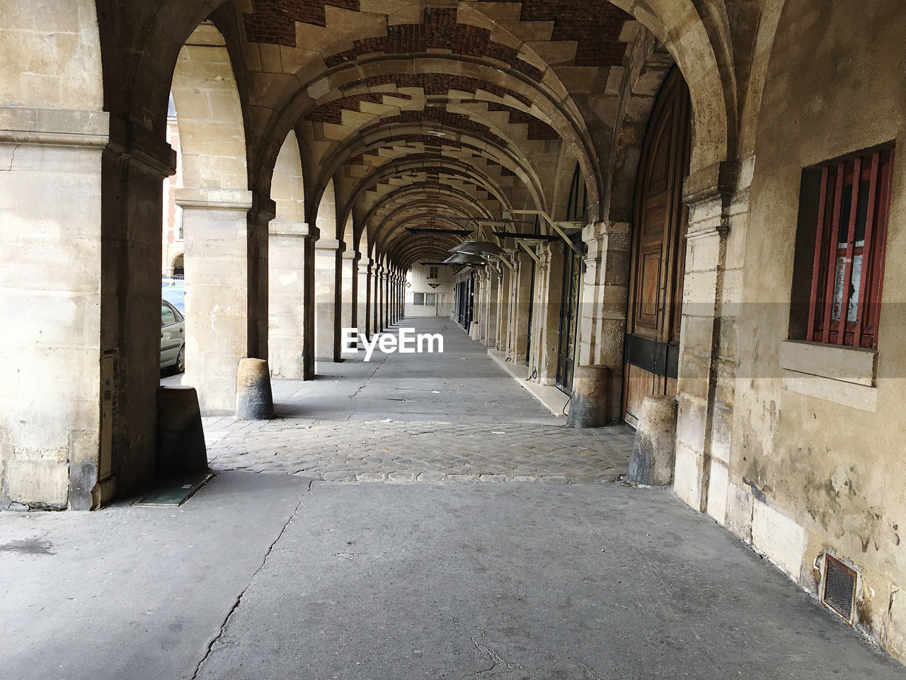 CORRIDOR OF BUILDING WITH COLONNADE