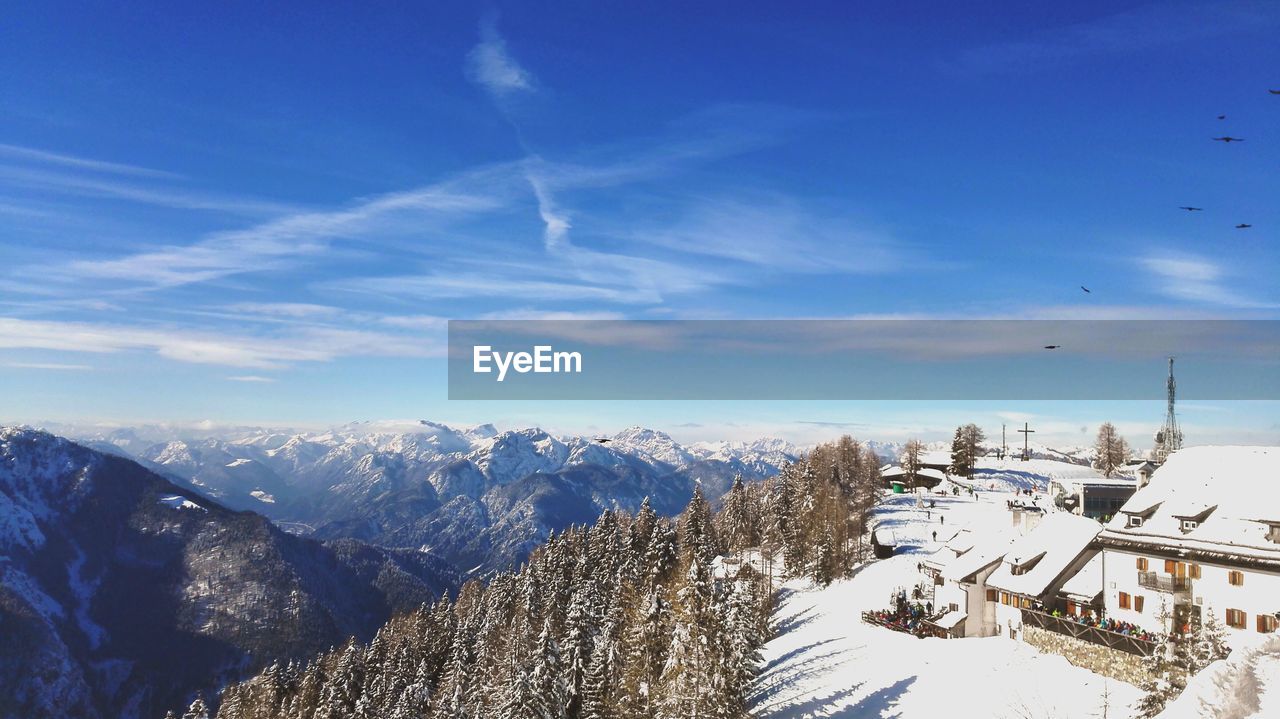 Scenic view of snowcapped mountains against sky