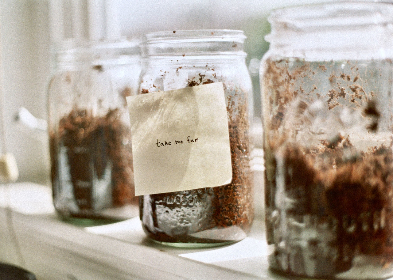 Close-up of note on jar