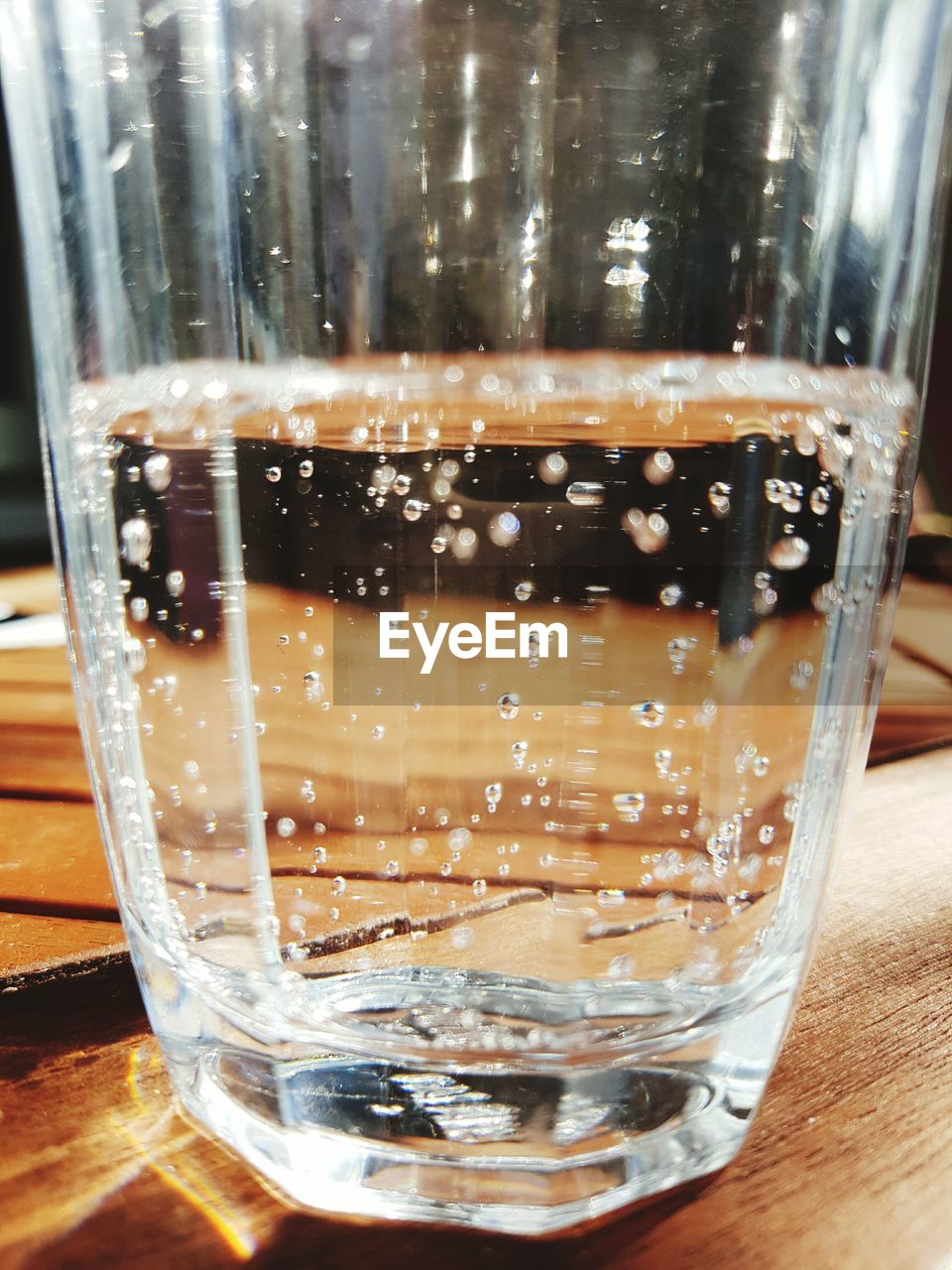 CLOSE-UP OF WATER ON TABLE