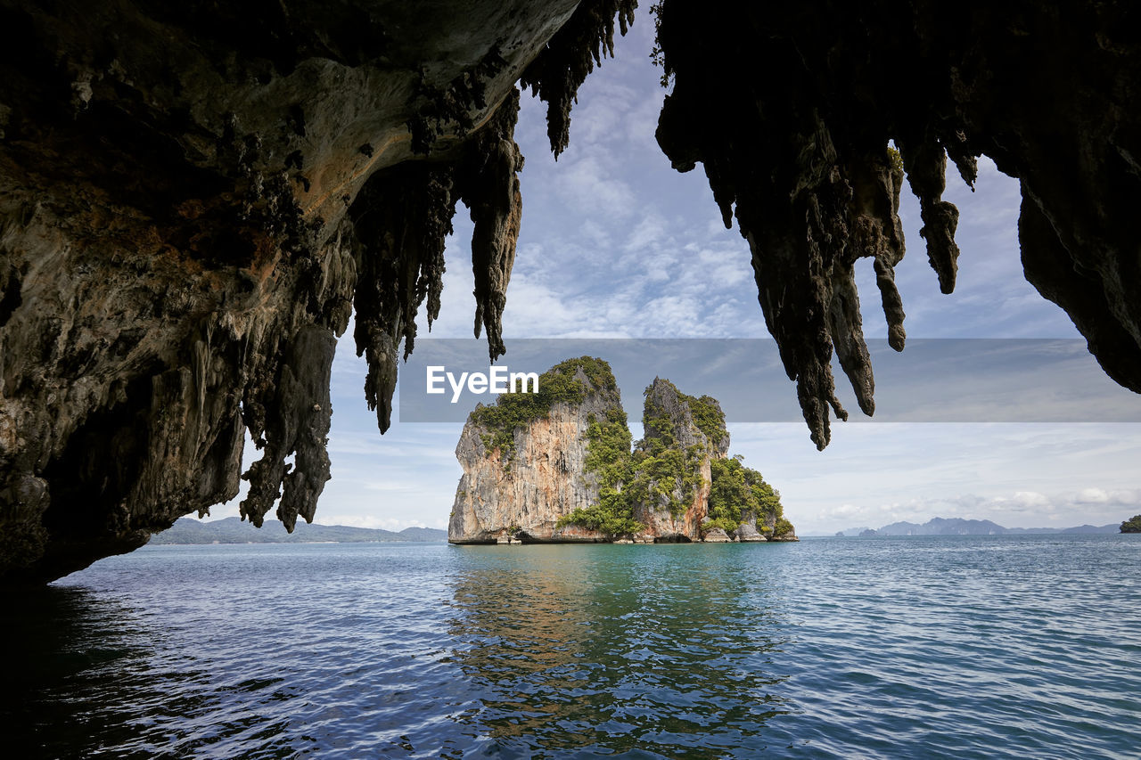 View from karst cave on tropical island. beautiful seascape near krabi, thailand.