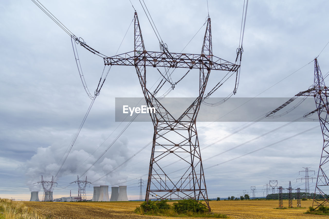 LOW ANGLE VIEW OF ELECTRICITY PYLON AGAINST SKY