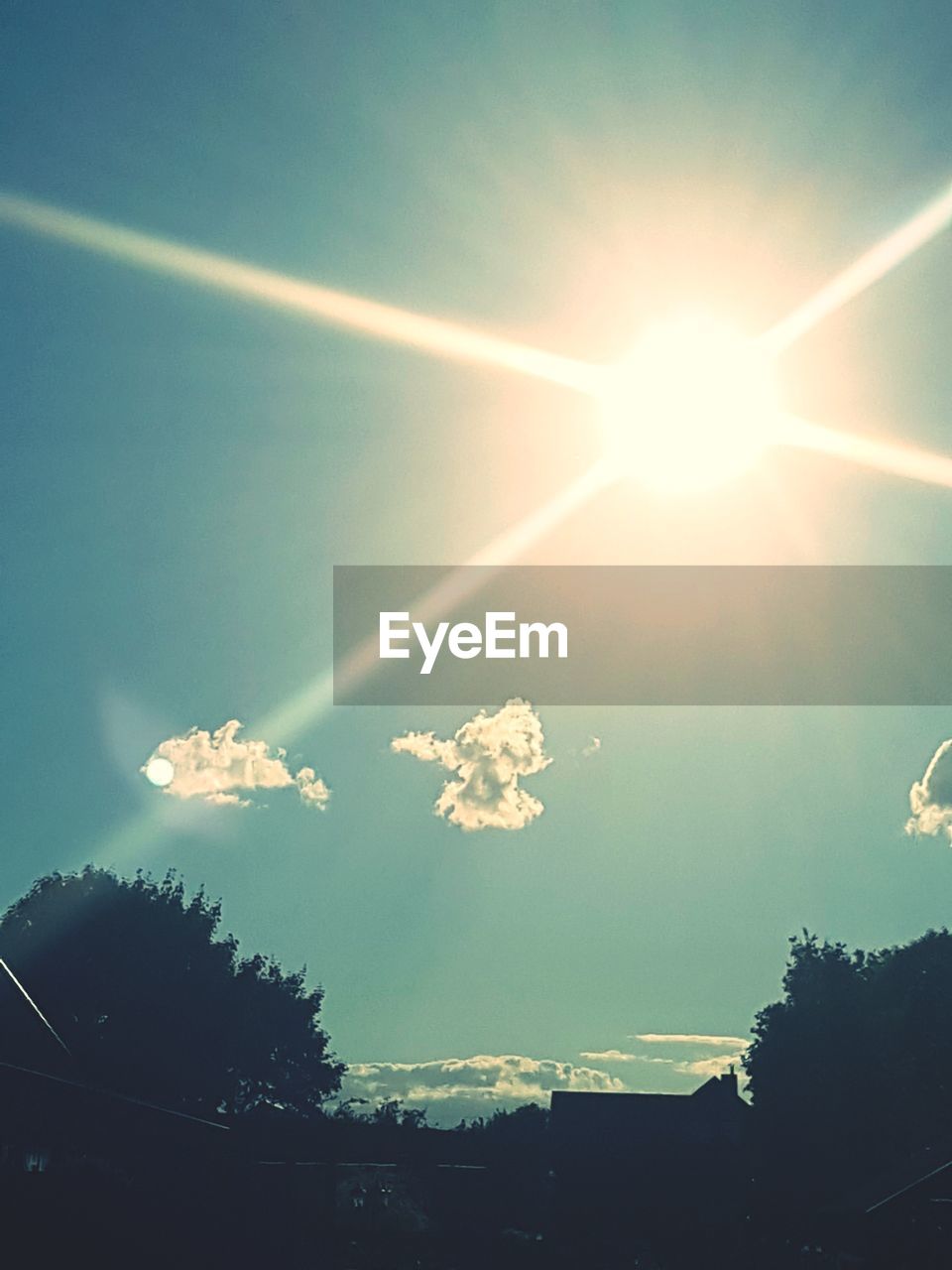 LOW ANGLE VIEW OF VAPOR TRAILS AGAINST SKY