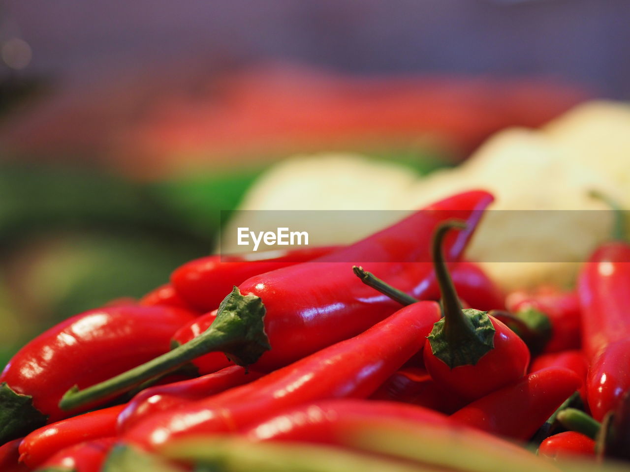 Close-up of red chili peppers for sale in market