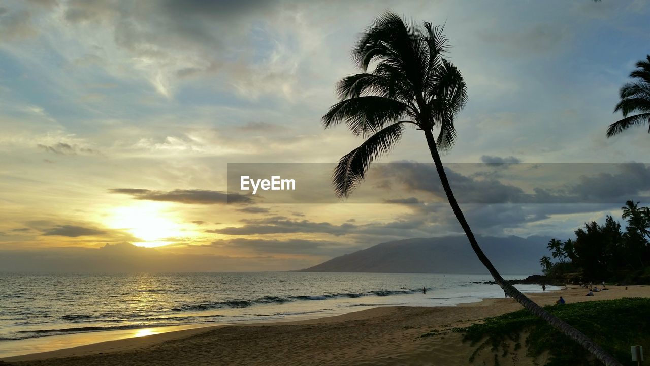 Scenic view of sea against sky at sunset