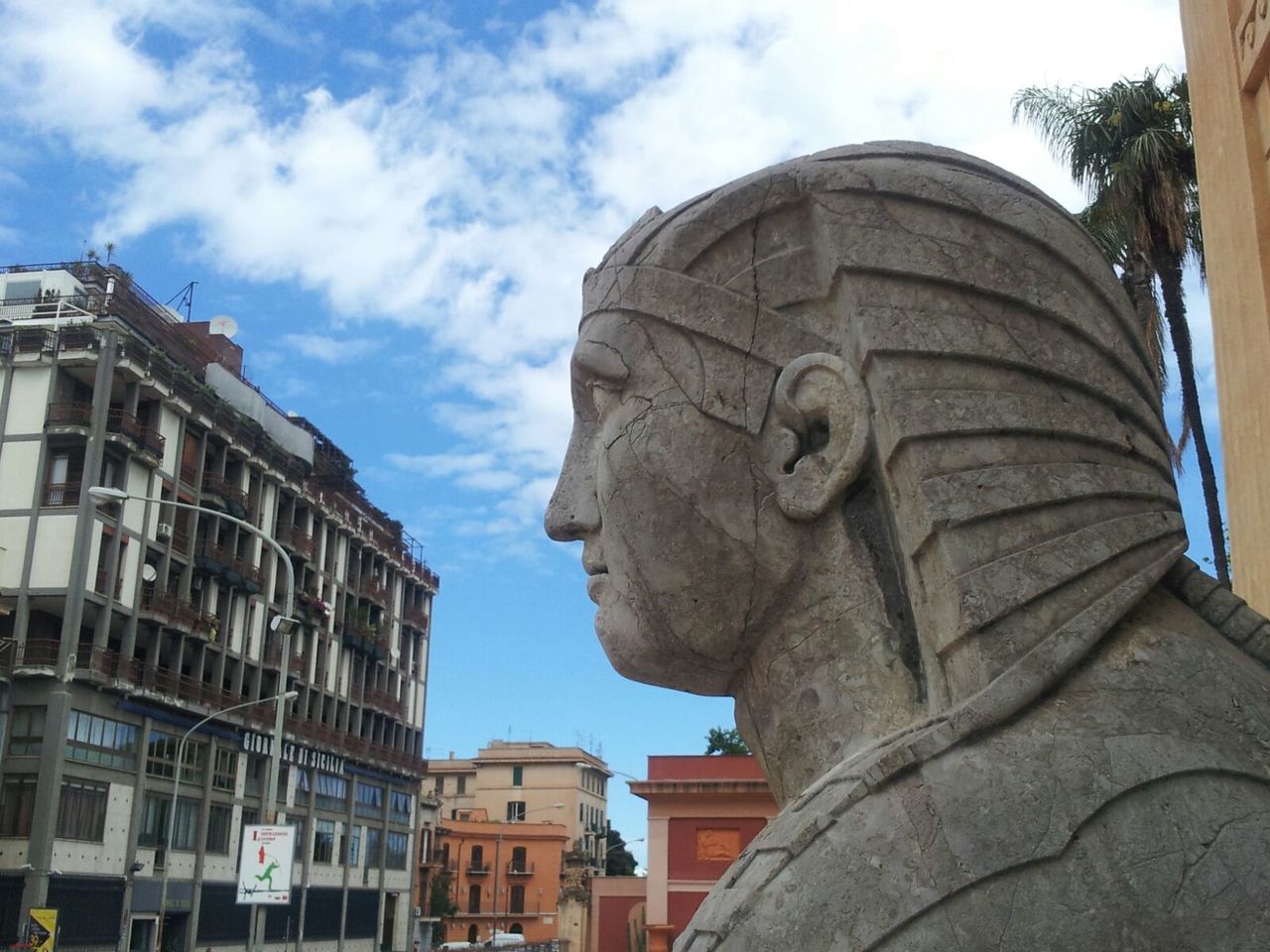 LOW ANGLE VIEW OF A STATUE