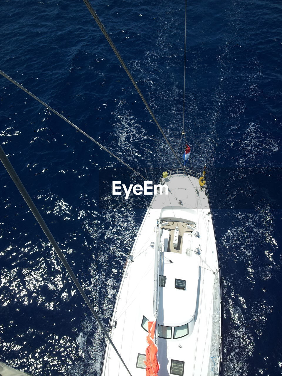 High angle view of ship sailing on sea