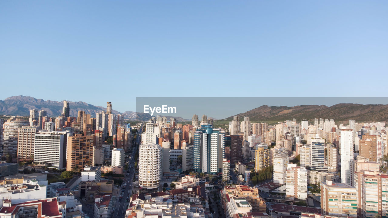 high angle view of cityscape against clear sky