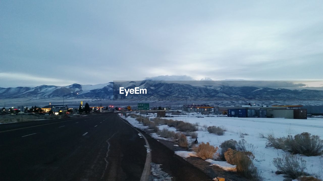 PANORAMIC VIEW OF ILLUMINATED CITY DURING WINTER