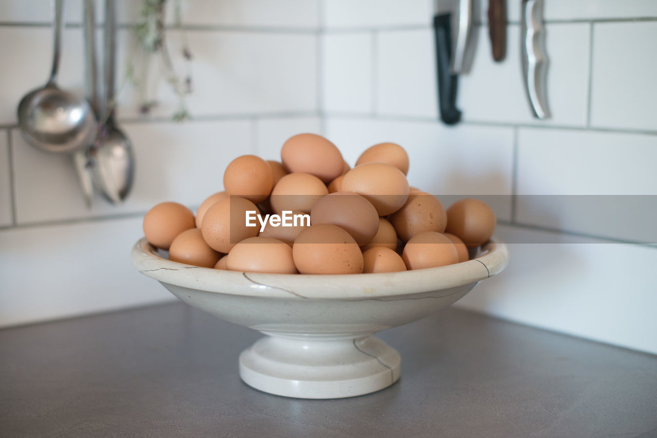 Close-up of eggs in bowl on table