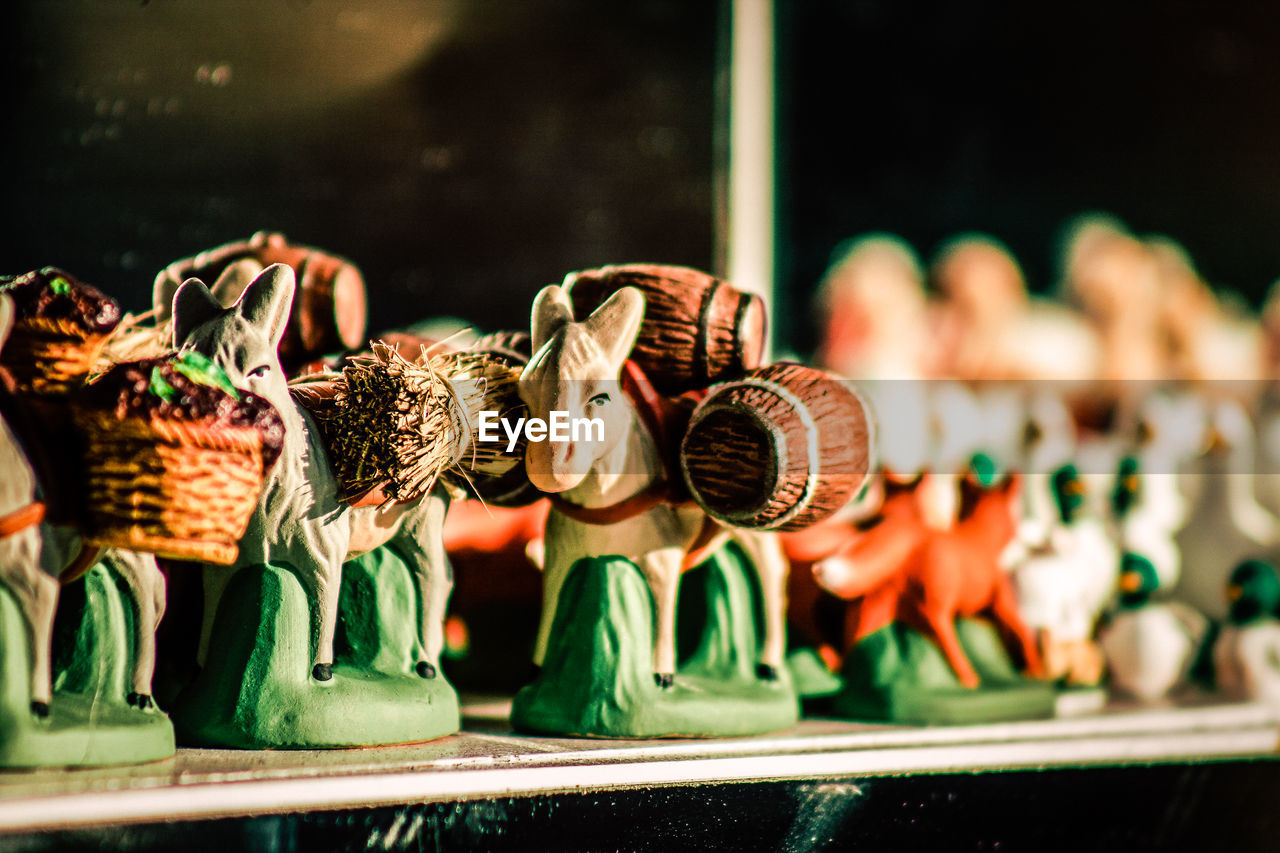 Close-up of souvenirs for sale in market