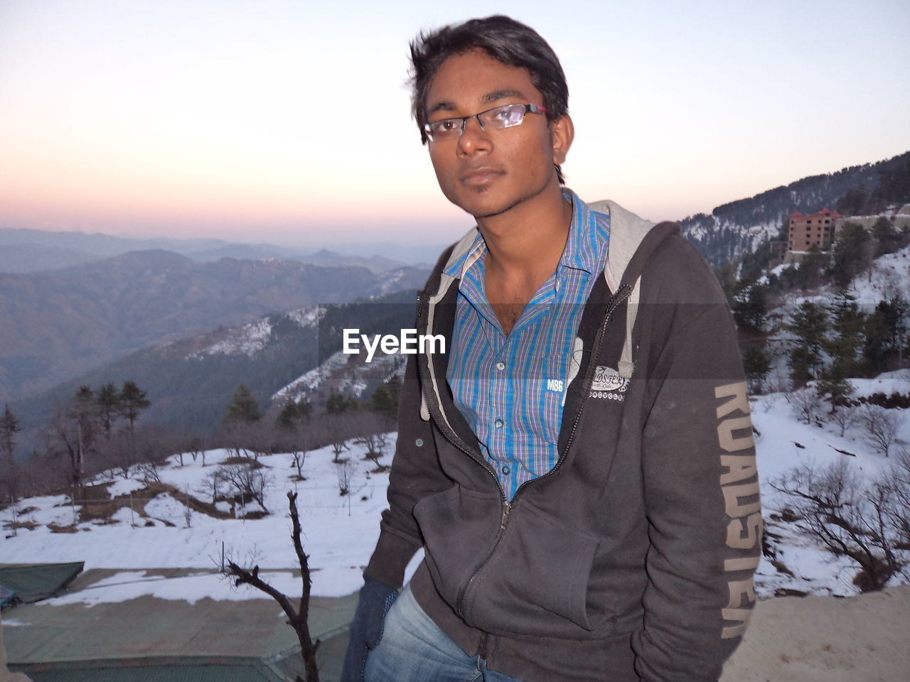 Portrait of man in mountains against sky