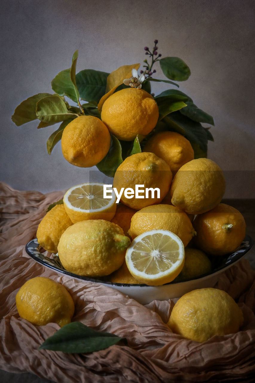 Close-up of lemon fruits on table