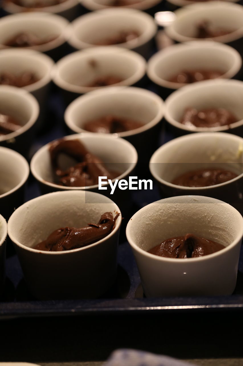 Food served in cups on tray