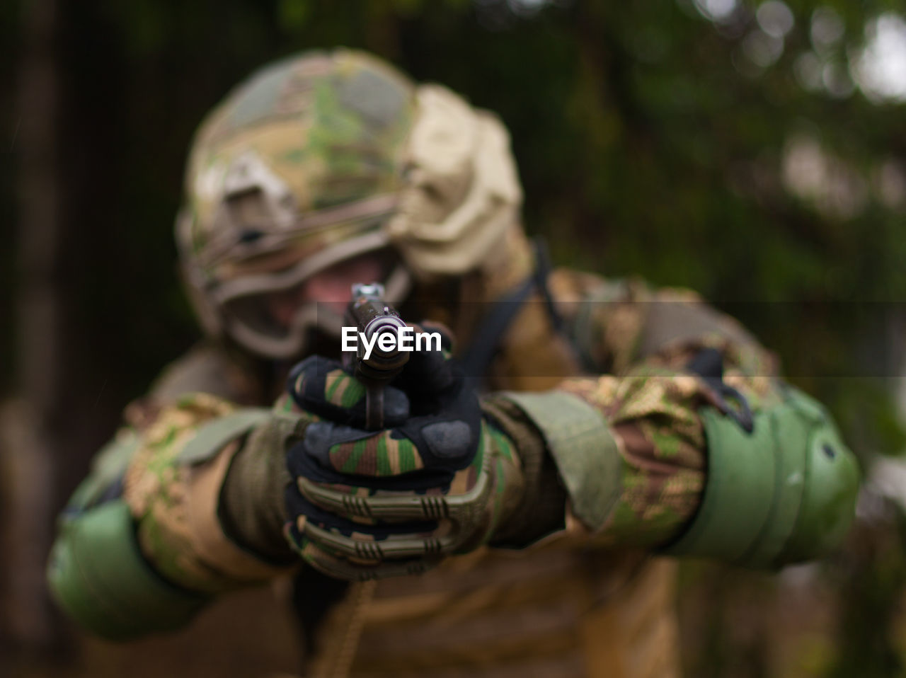 National guard soldier shoots a gun