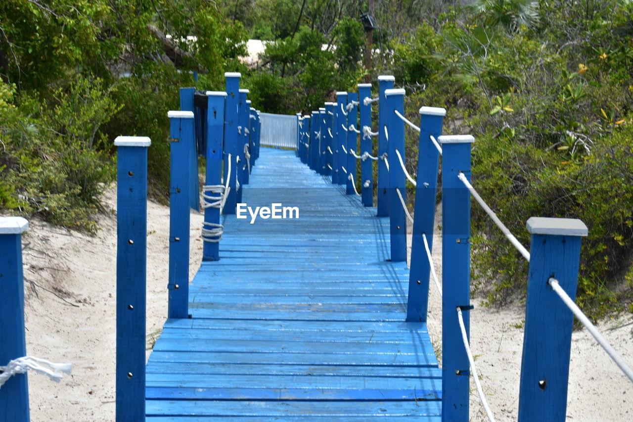 EMPTY WOODEN POSTS ON FOOTPATH