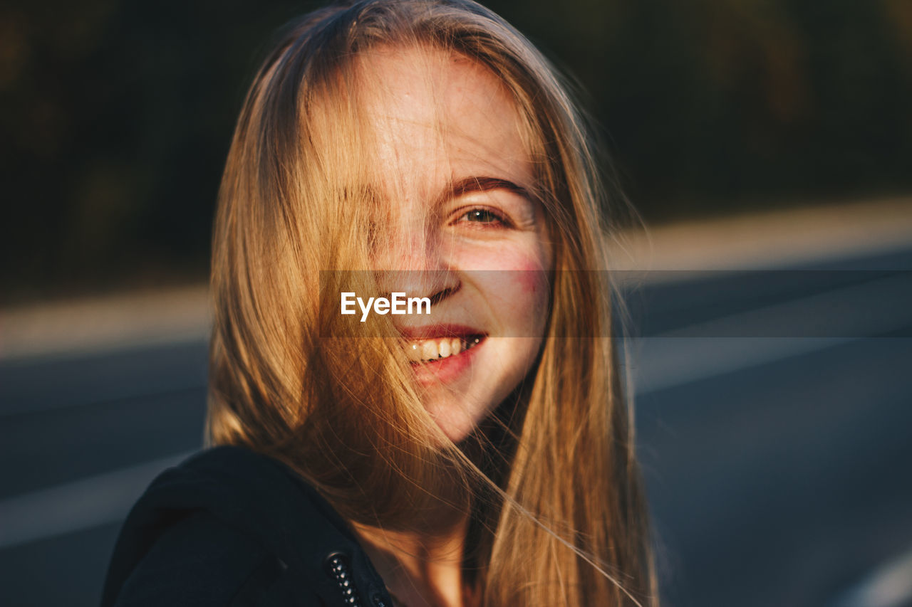 Portrait of a smiling young woman