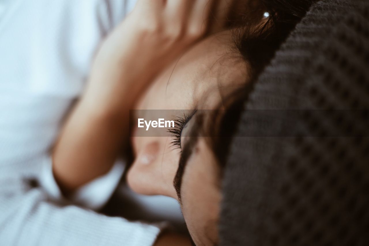 Close-up of young woman sleeping