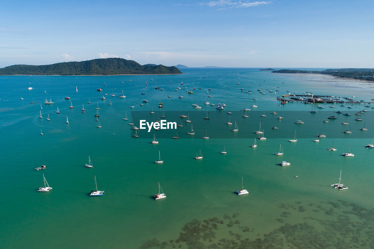 high angle view of boats in sea against sky