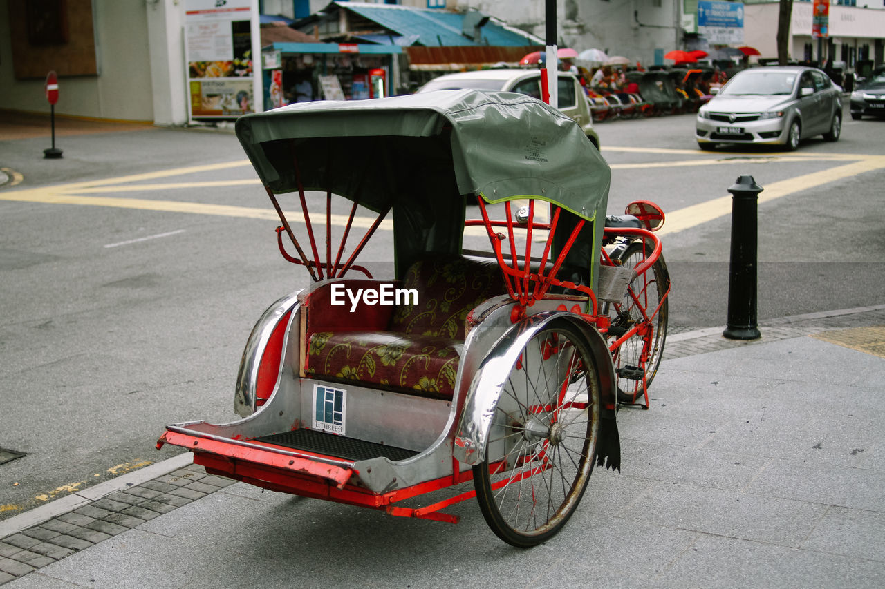 Pedicab parked on street