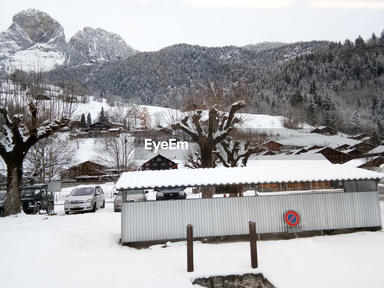 BUILT STRUCTURE ON SNOW COVERED MOUNTAIN