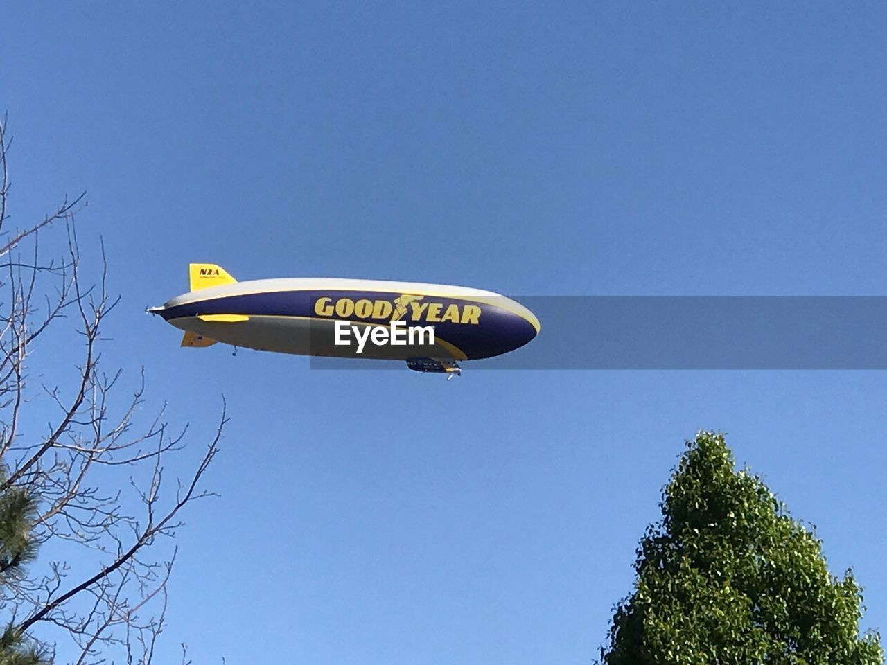 LOW ANGLE VIEW OF INFORMATION SIGN AGAINST CLEAR SKY