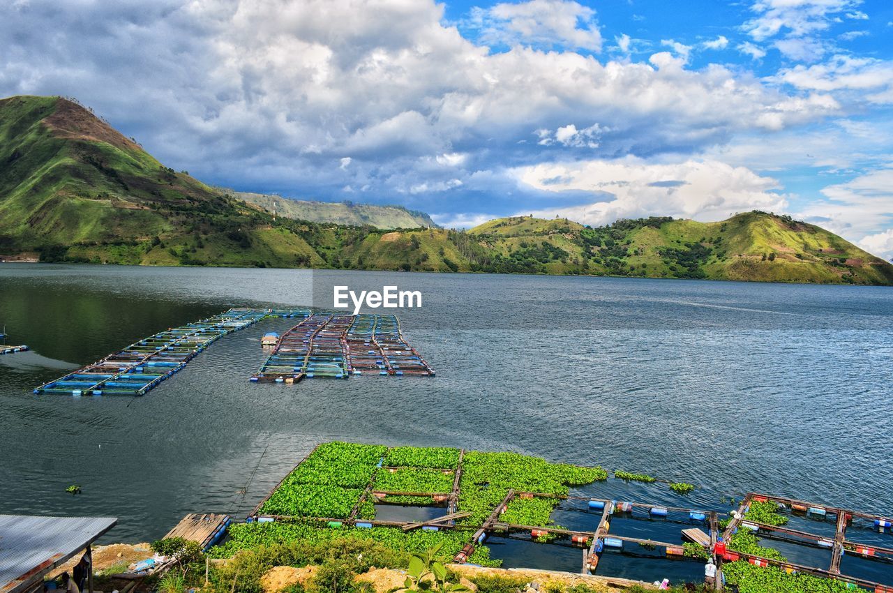 View of fish cages on lake toba indonesia with blue sky