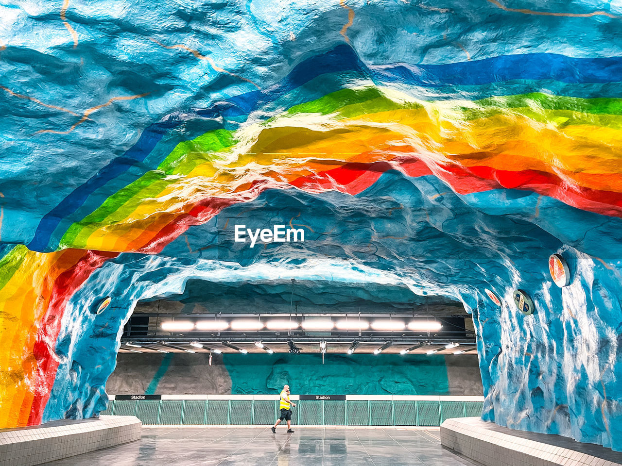 PEOPLE SWIMMING IN POOL