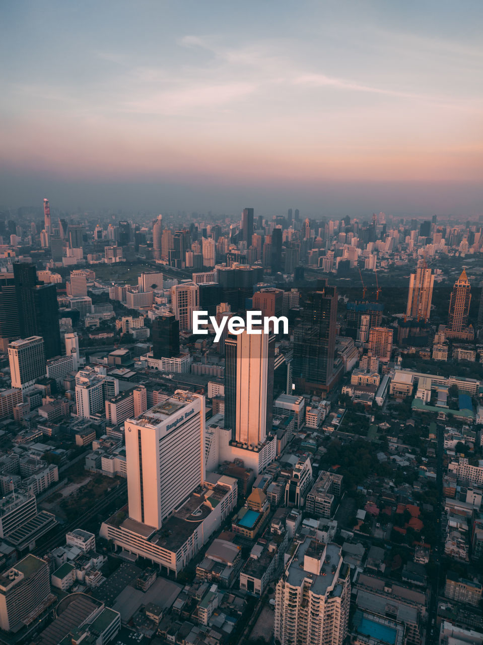 High angle view of cityscape against sky during sunset