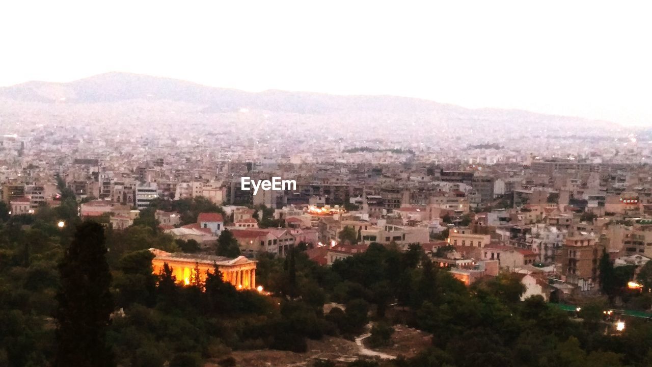 AERIAL VIEW OF CITYSCAPE AGAINST SKY