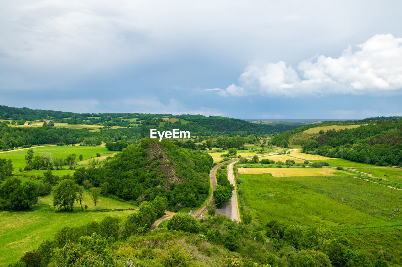 View of the chain of auvergne volcanoes under a thunderstorm