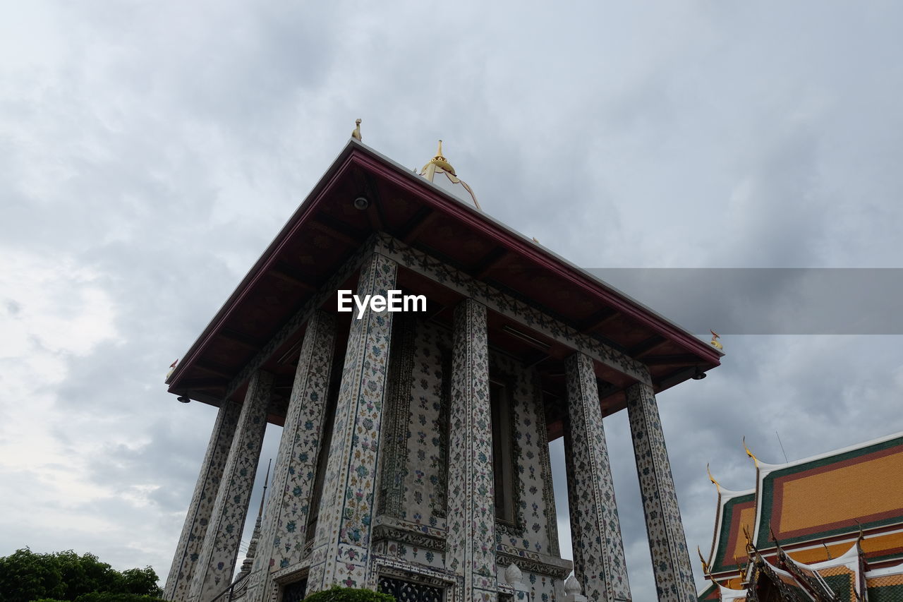 LOW ANGLE VIEW OF TEMPLE AGAINST BUILDING