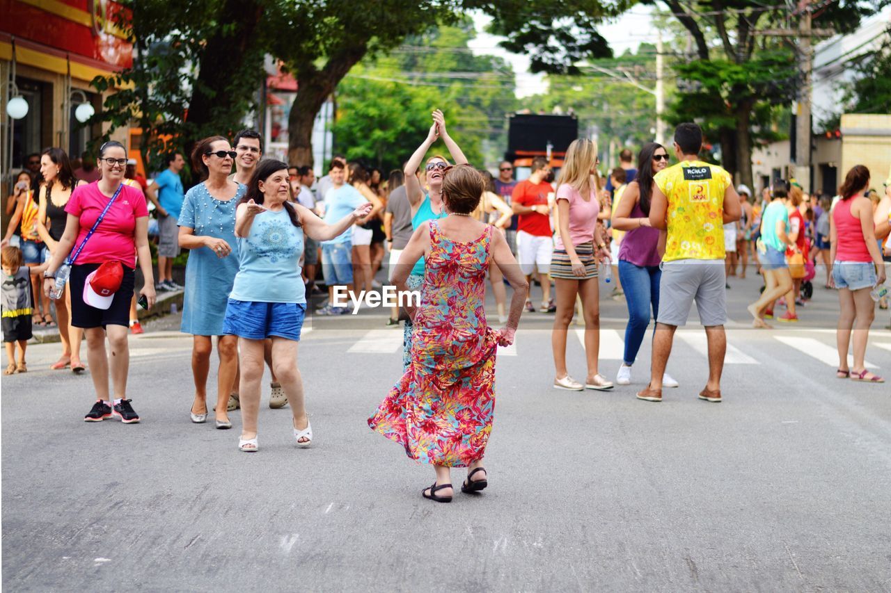 GROUP OF PEOPLE ON THE STREET