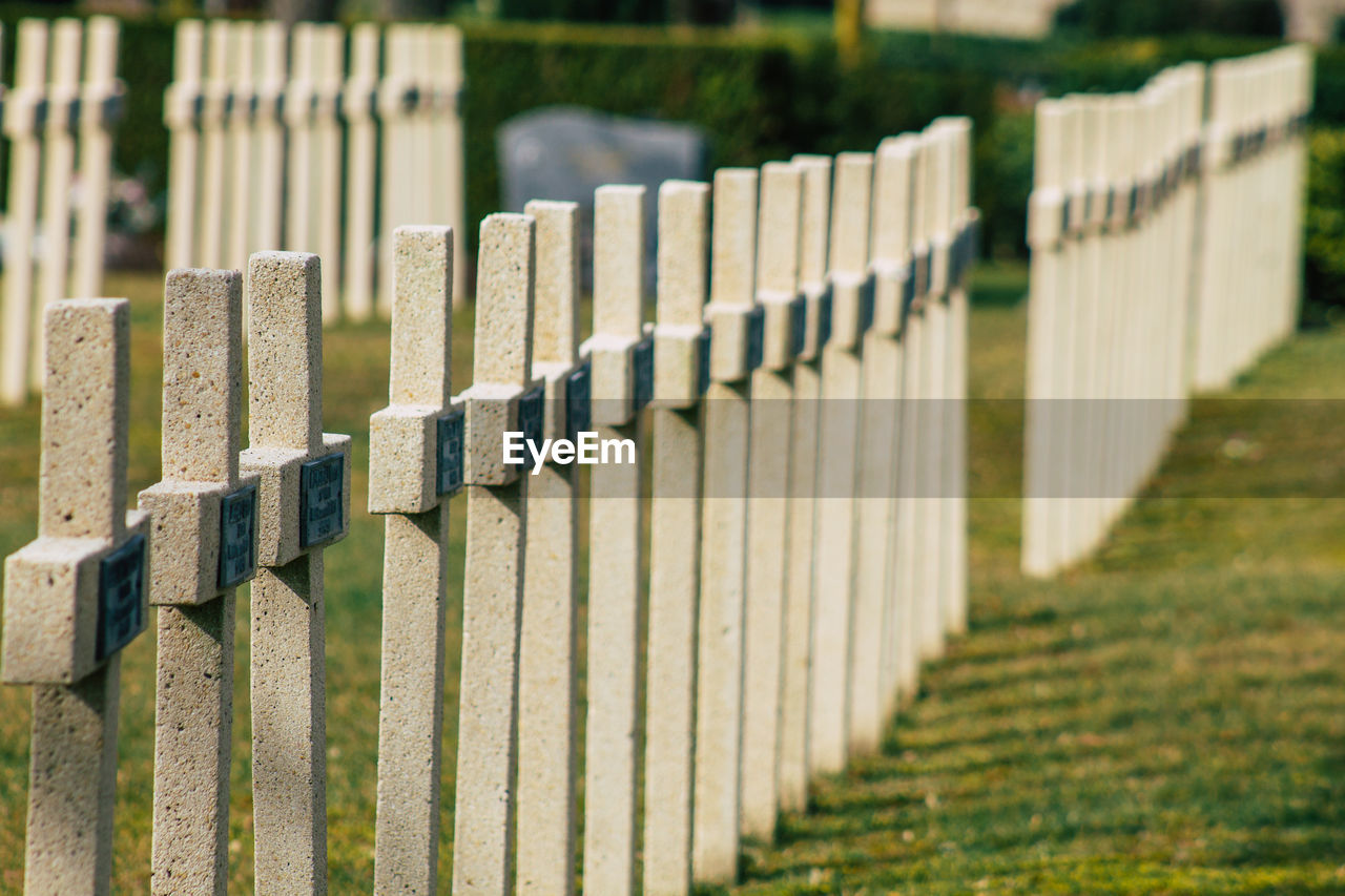 ROW OF FENCE ON CEMETERY