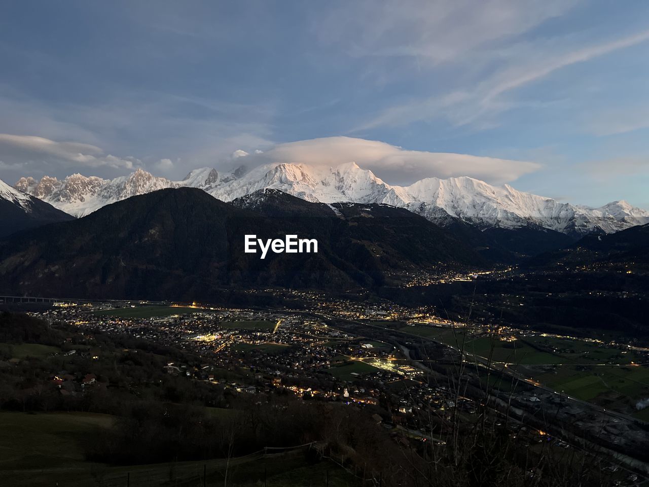 mountain, scenics - nature, environment, sky, snow, landscape, mountain range, beauty in nature, cold temperature, winter, snowcapped mountain, cloud, nature, travel destinations, travel, land, no people, architecture, tourism, outdoors, city, tranquility, tranquil scene, mountain peak, building, building exterior, built structure, plant