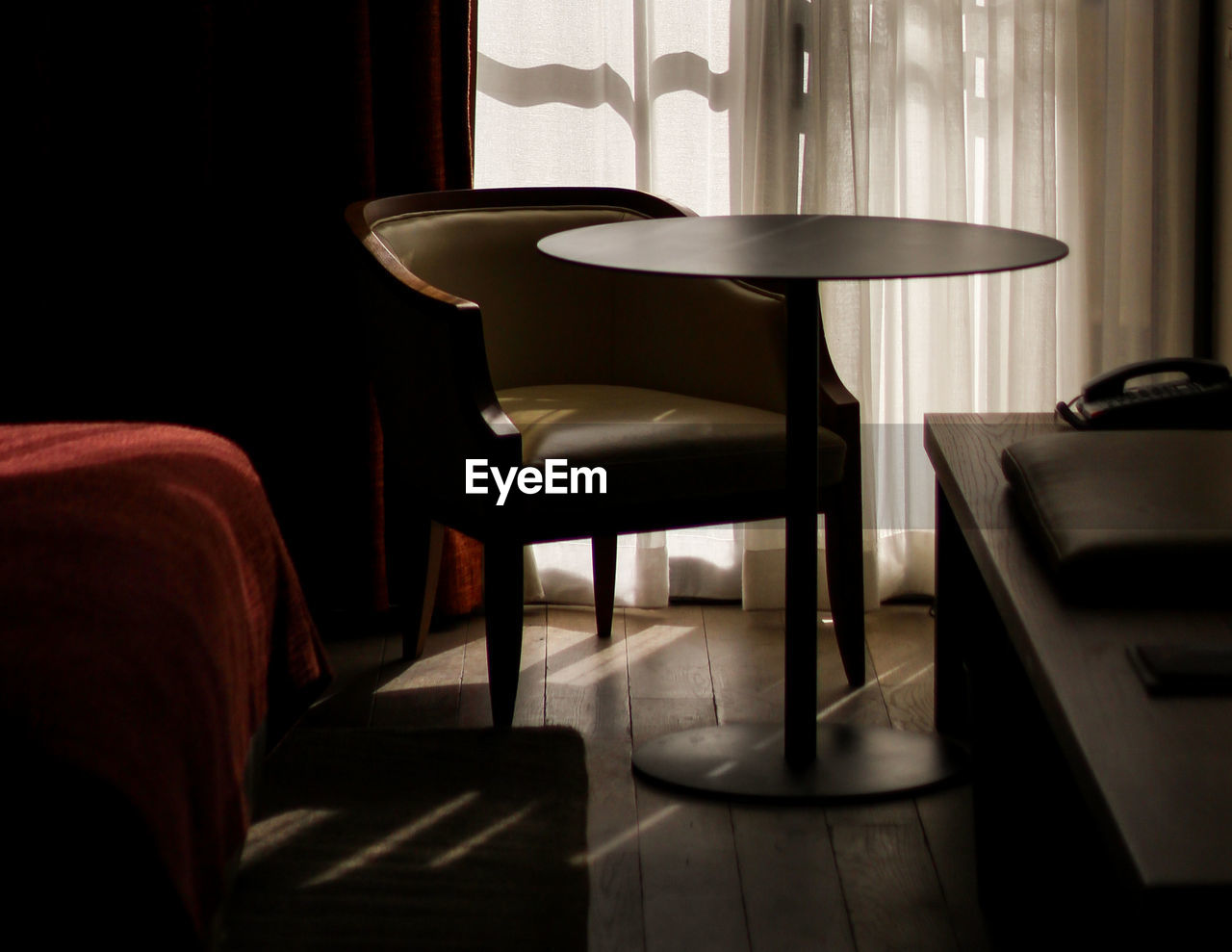 EMPTY CHAIRS IN ROOM