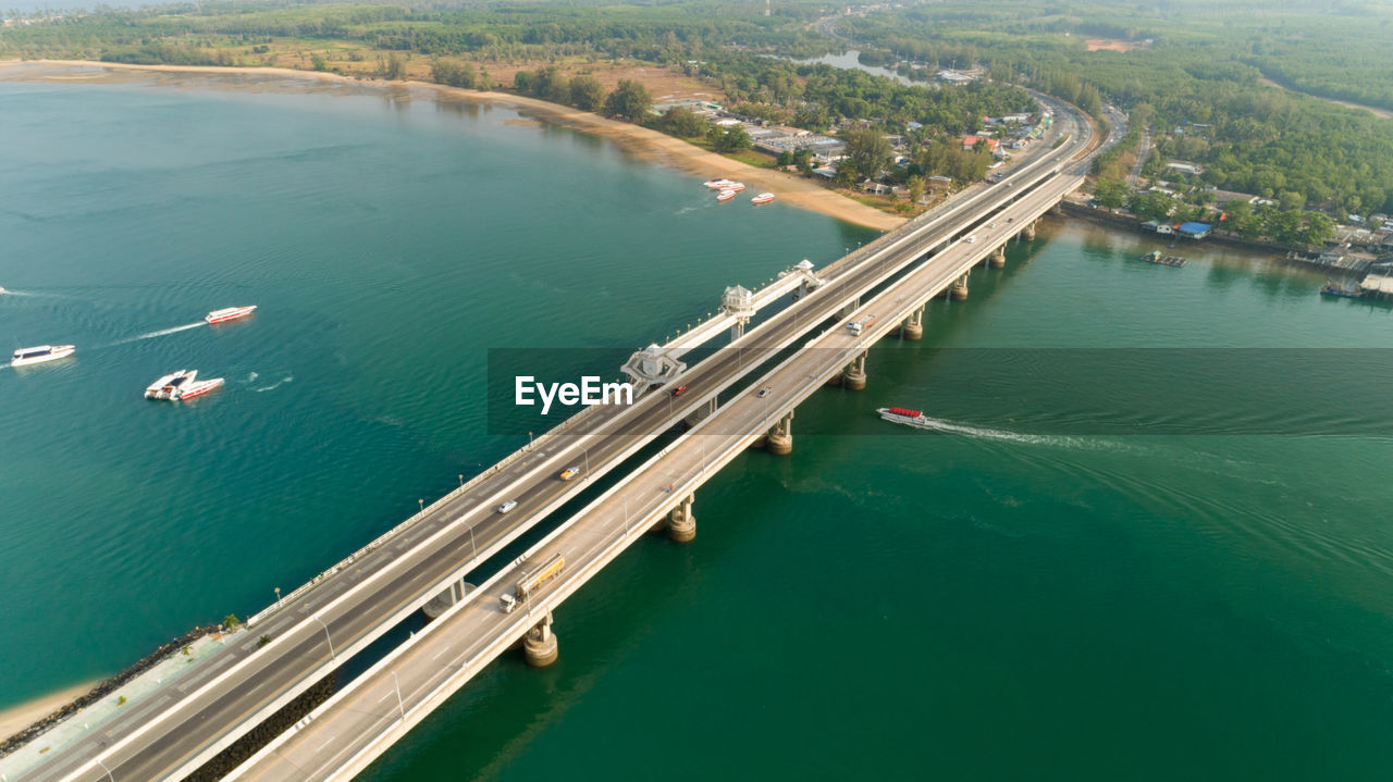 High angle view of bridge over sea in city