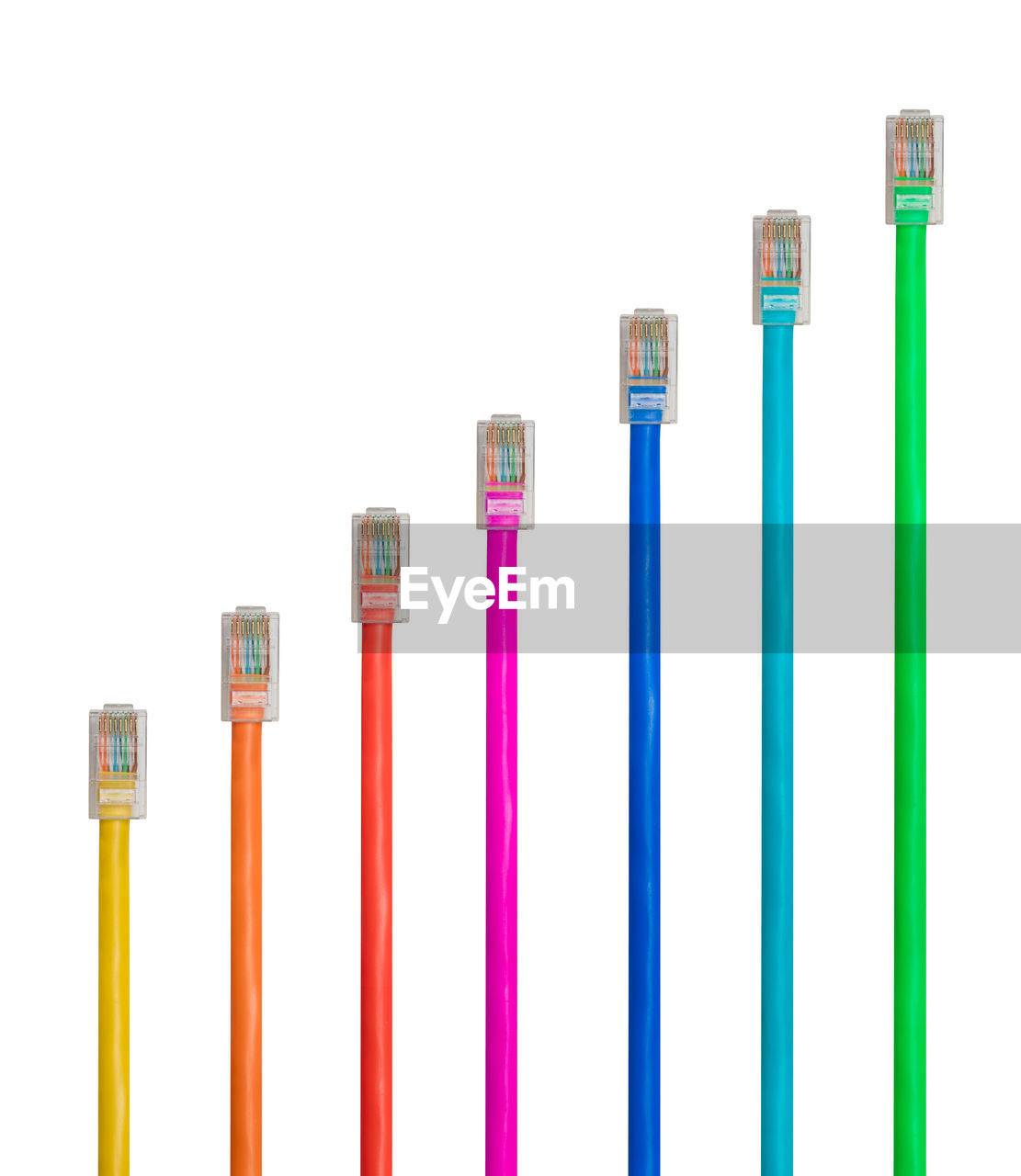 Close-up of colorful cables over white background