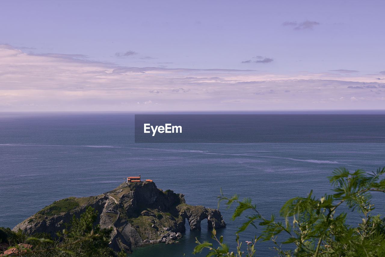 scenic view of sea against sky at sunset