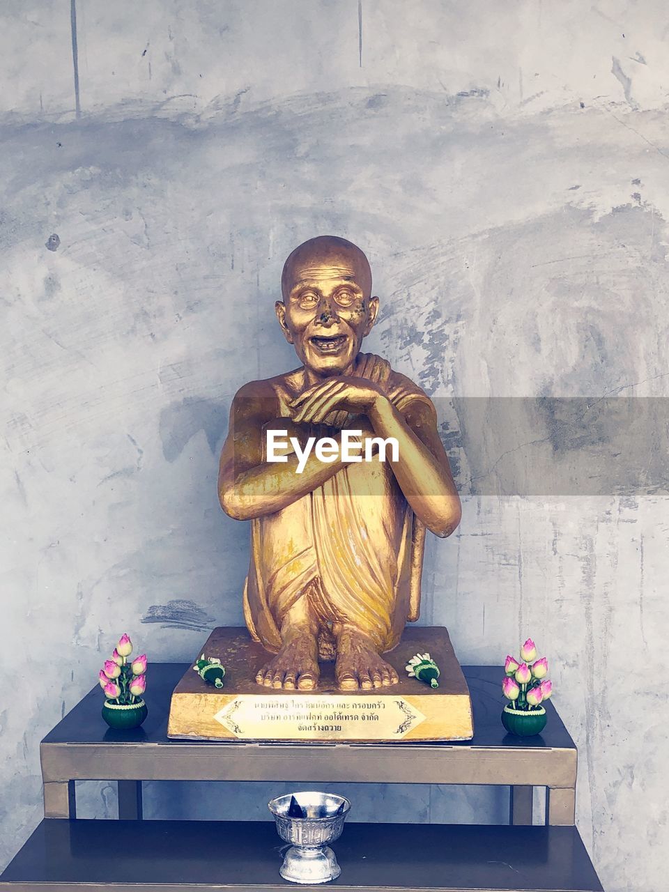 STATUE OF BUDDHA ON WALL