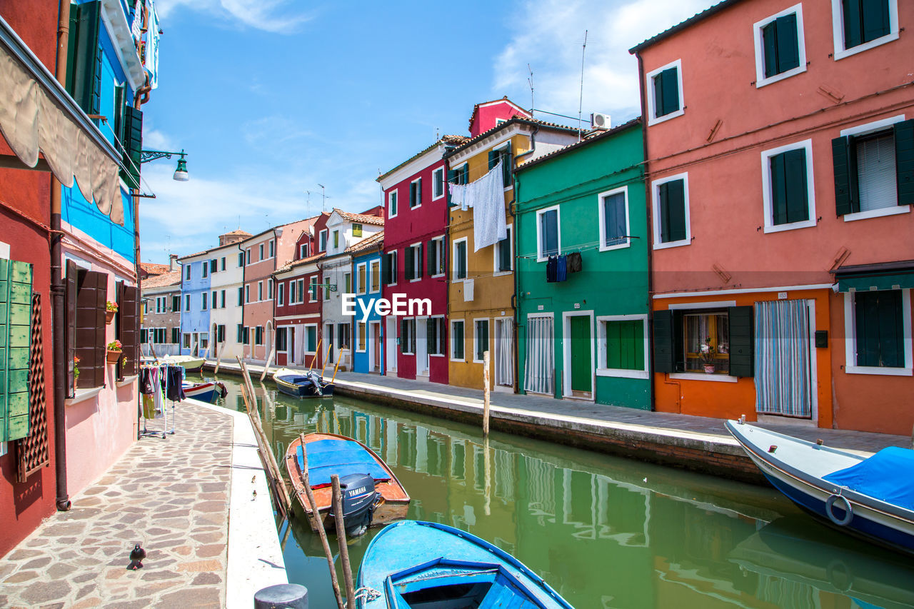 View of canal along buildings