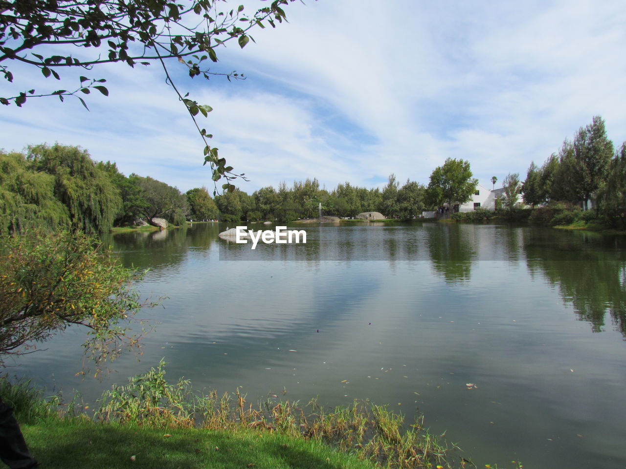 SCENIC VIEW OF LAKE WITH REFLECTION AGAINST SKY