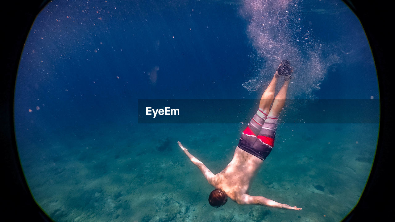 Man swimming in sea