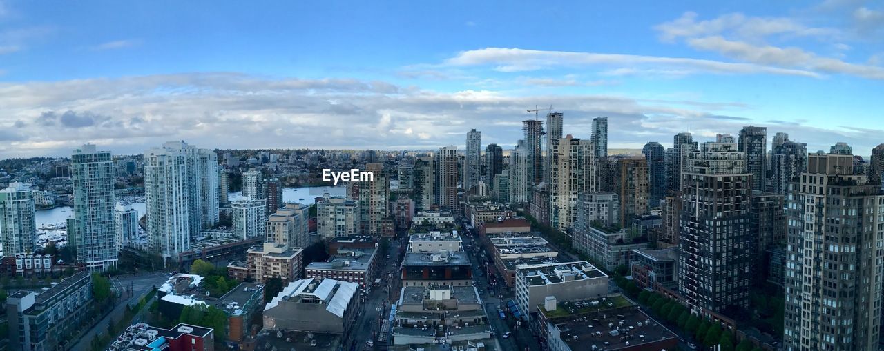 Skyscrapers and buildings in yaletown against sky