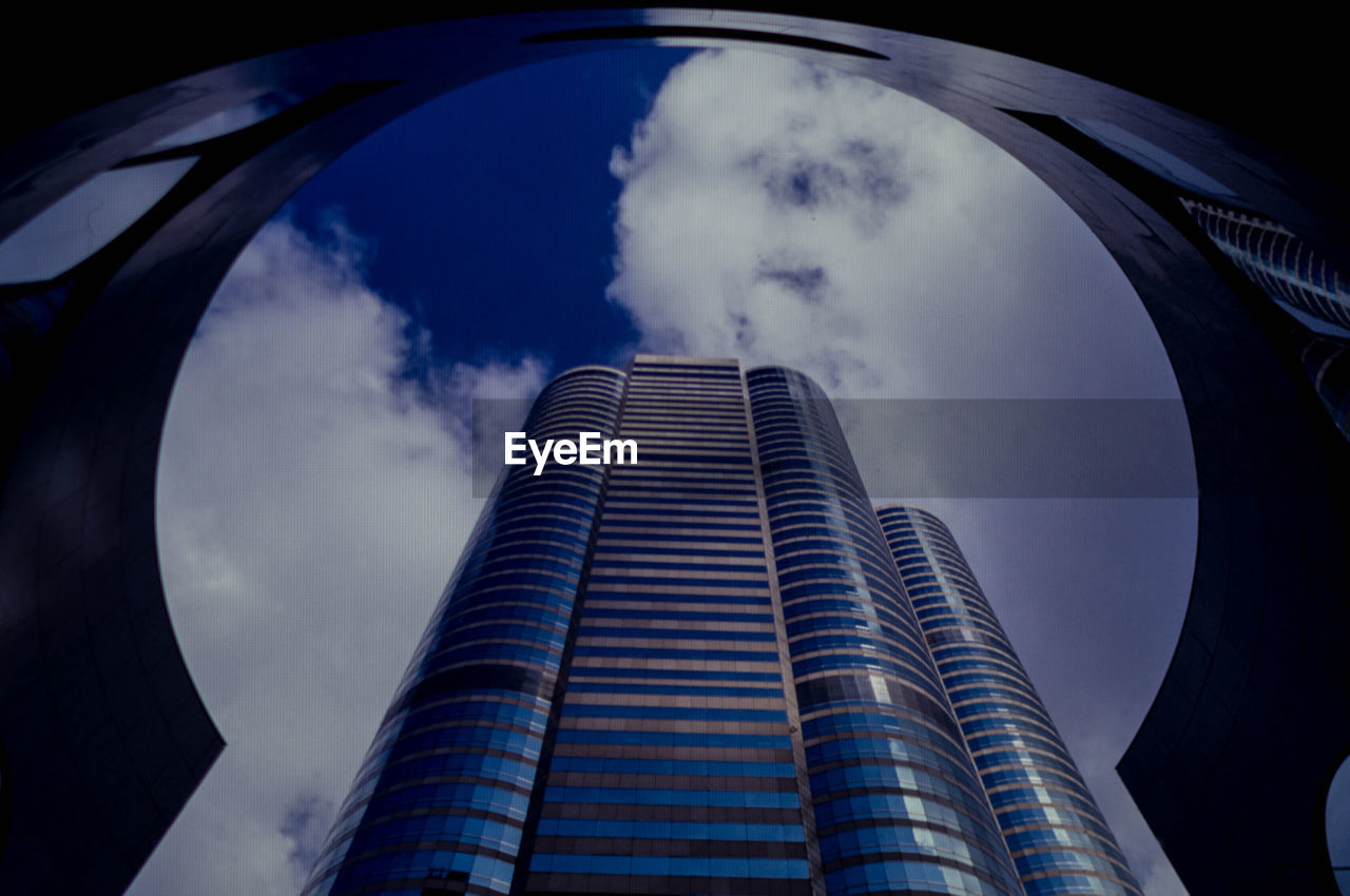 LOW ANGLE VIEW OF BUILDINGS AGAINST SKY