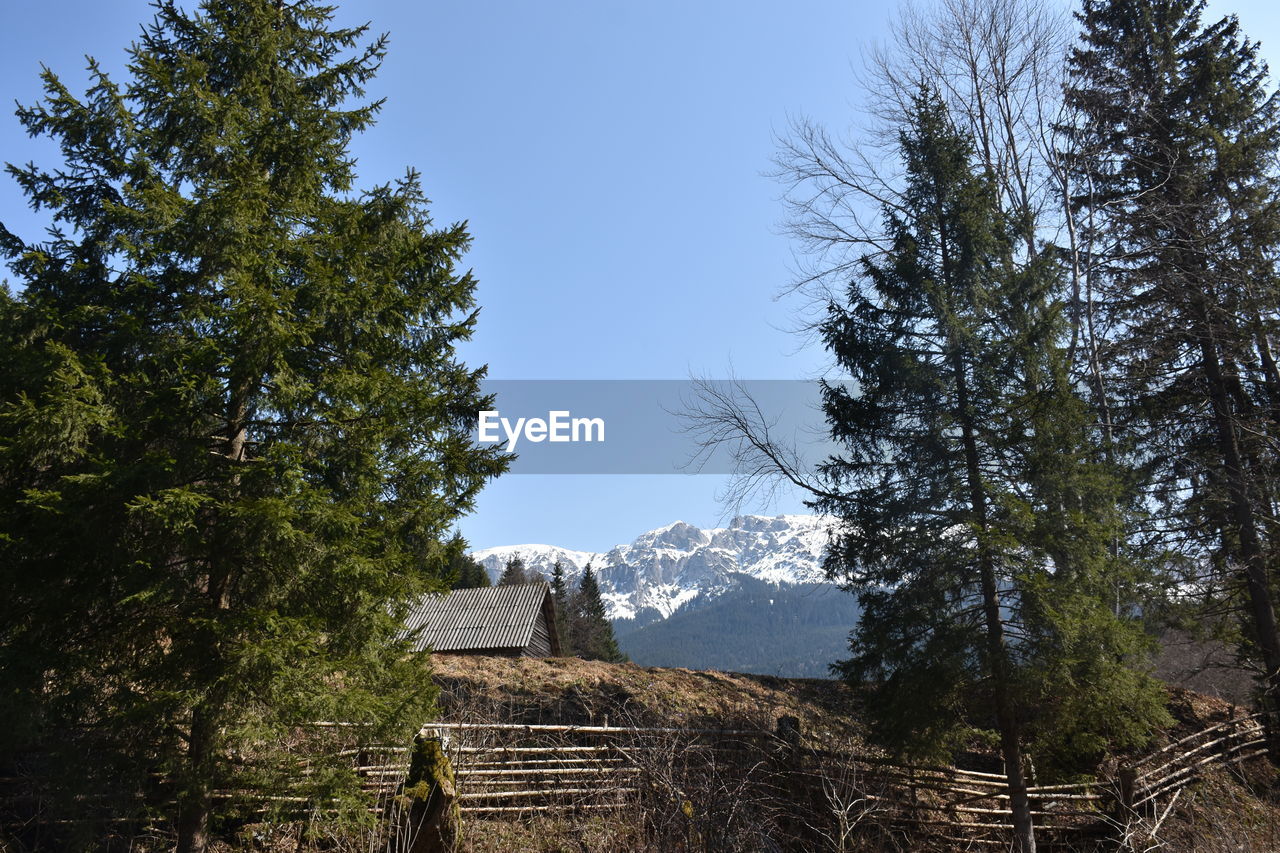 Built structure on mountain against clear sky