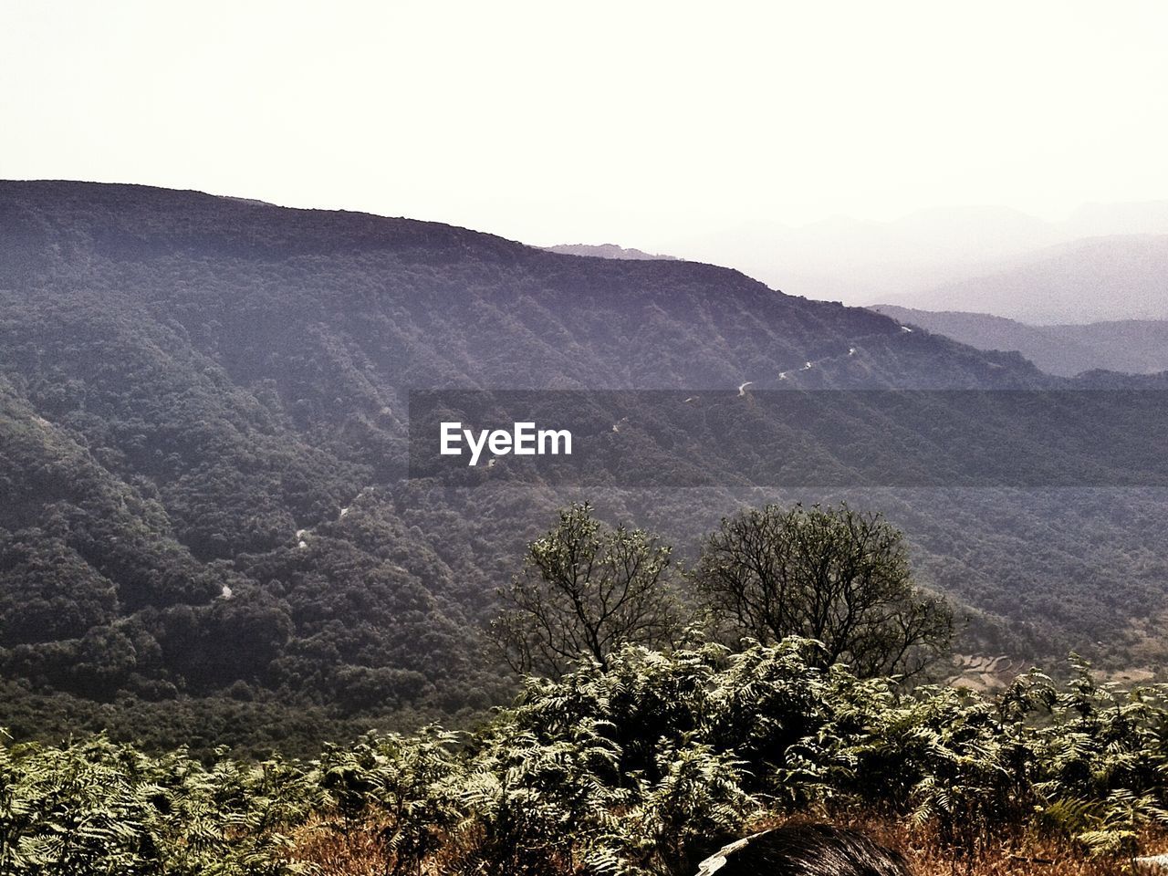 Scenic view of mountains against clear sky